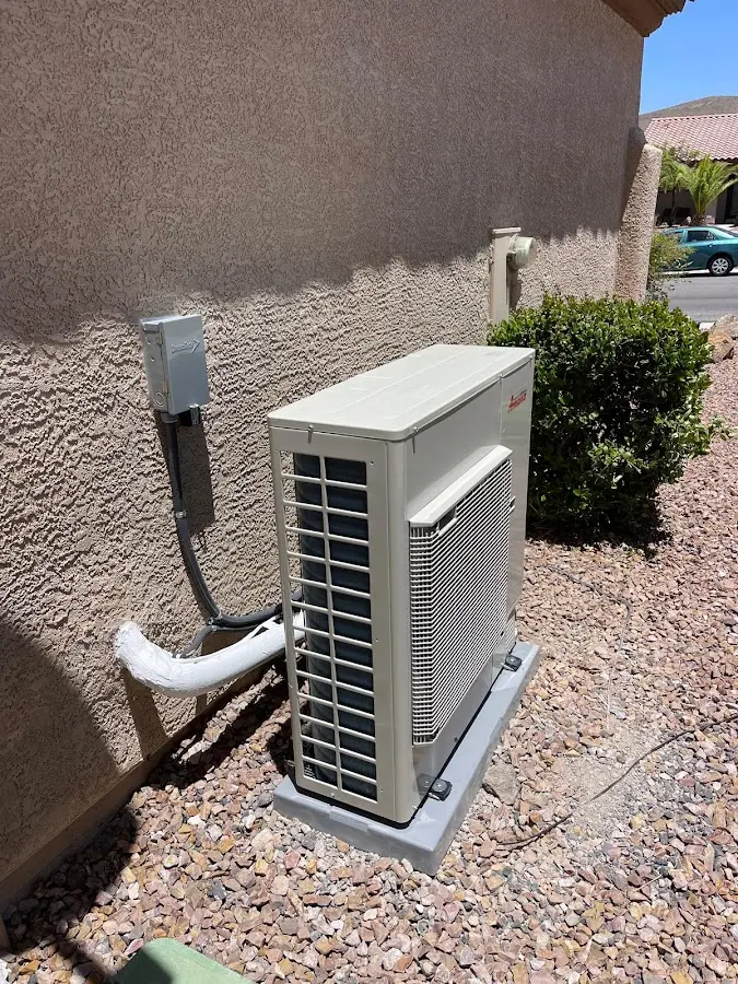 Residential air conditioning condenser unit in Madison